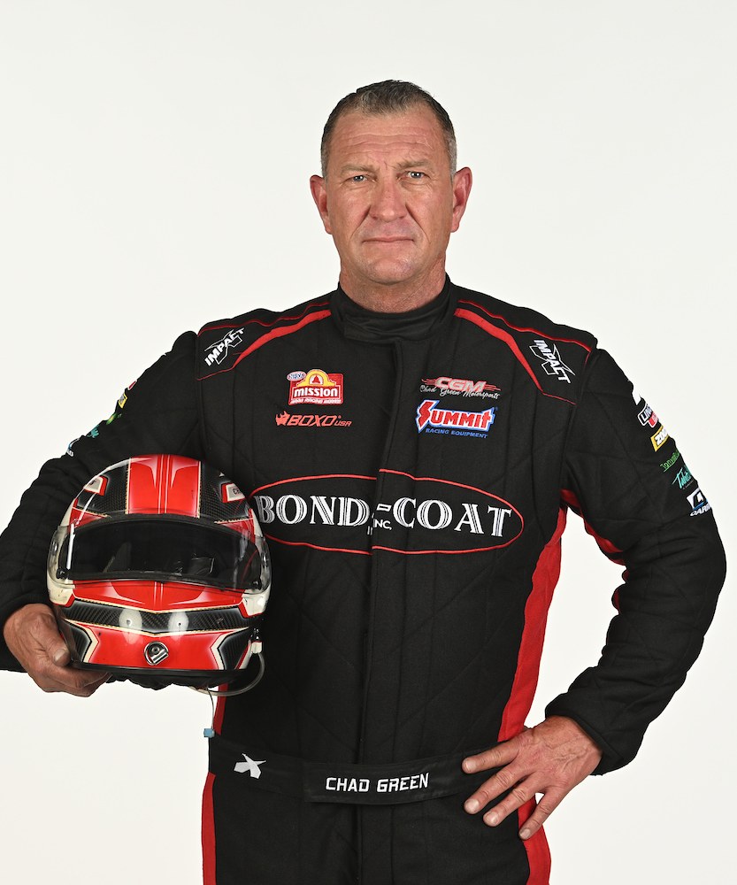 Chad Green in his Bond-Coat firesuit, studio portrait