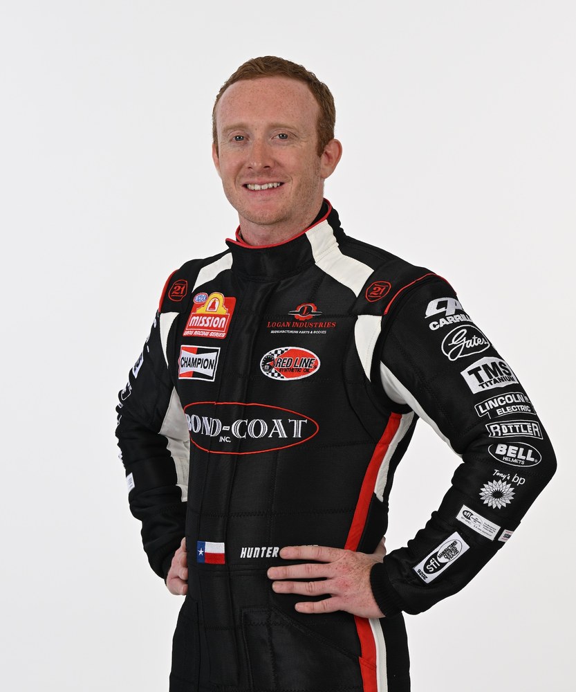 Hunter Green in his Bond-Coat firesuit, studio portrait