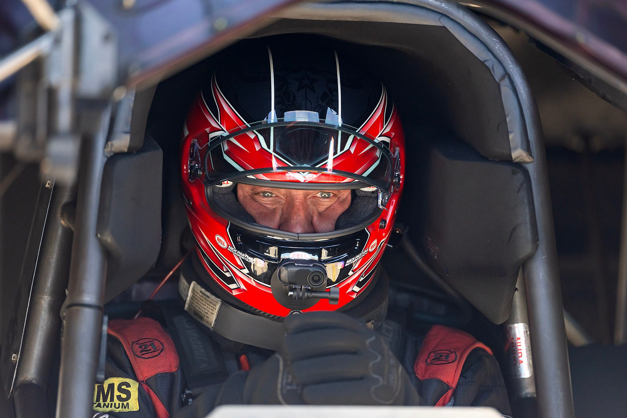 Visor up in the cockpit, strapped in before the run