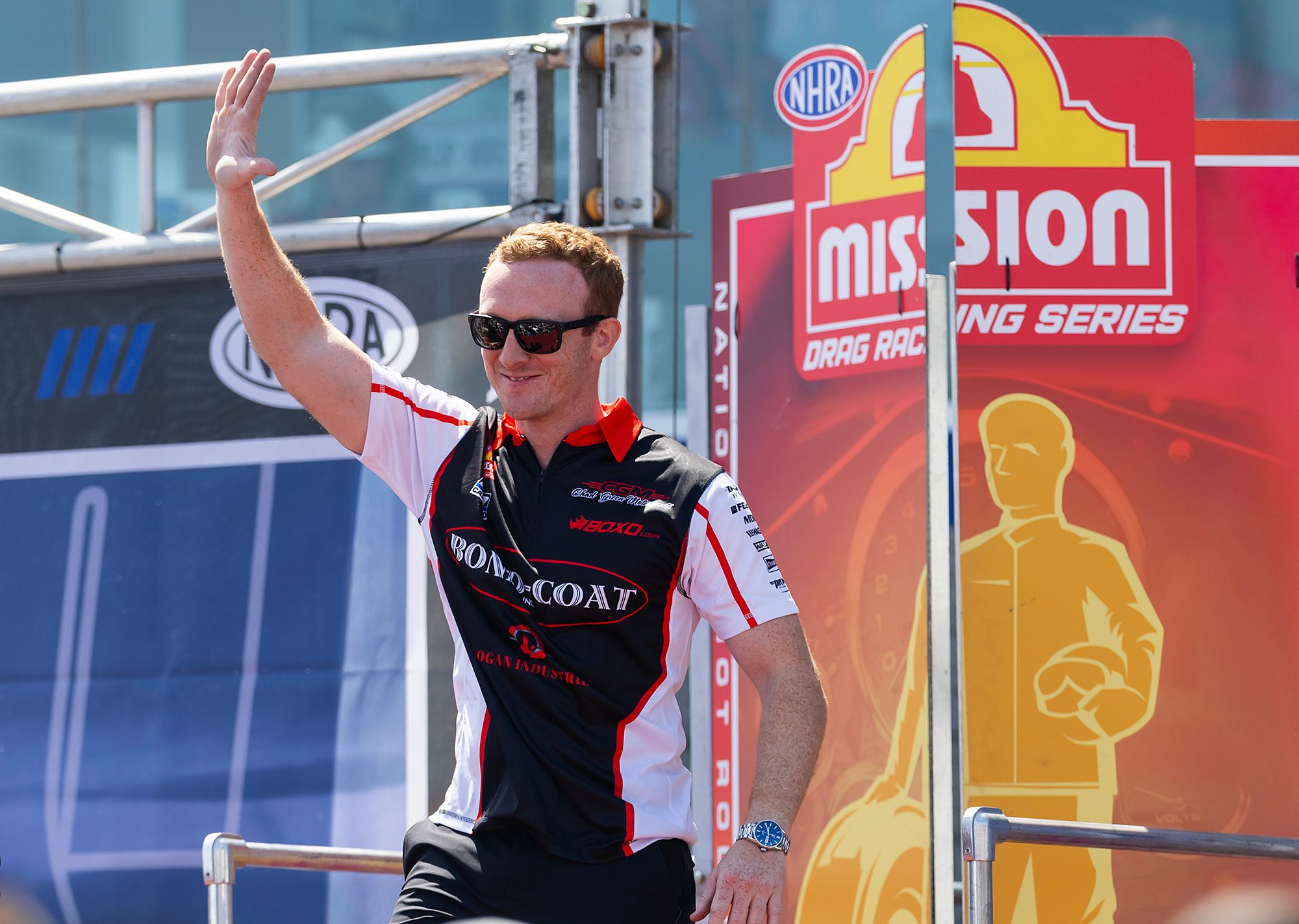 Hunter Green waves to the crowd during driver introductions