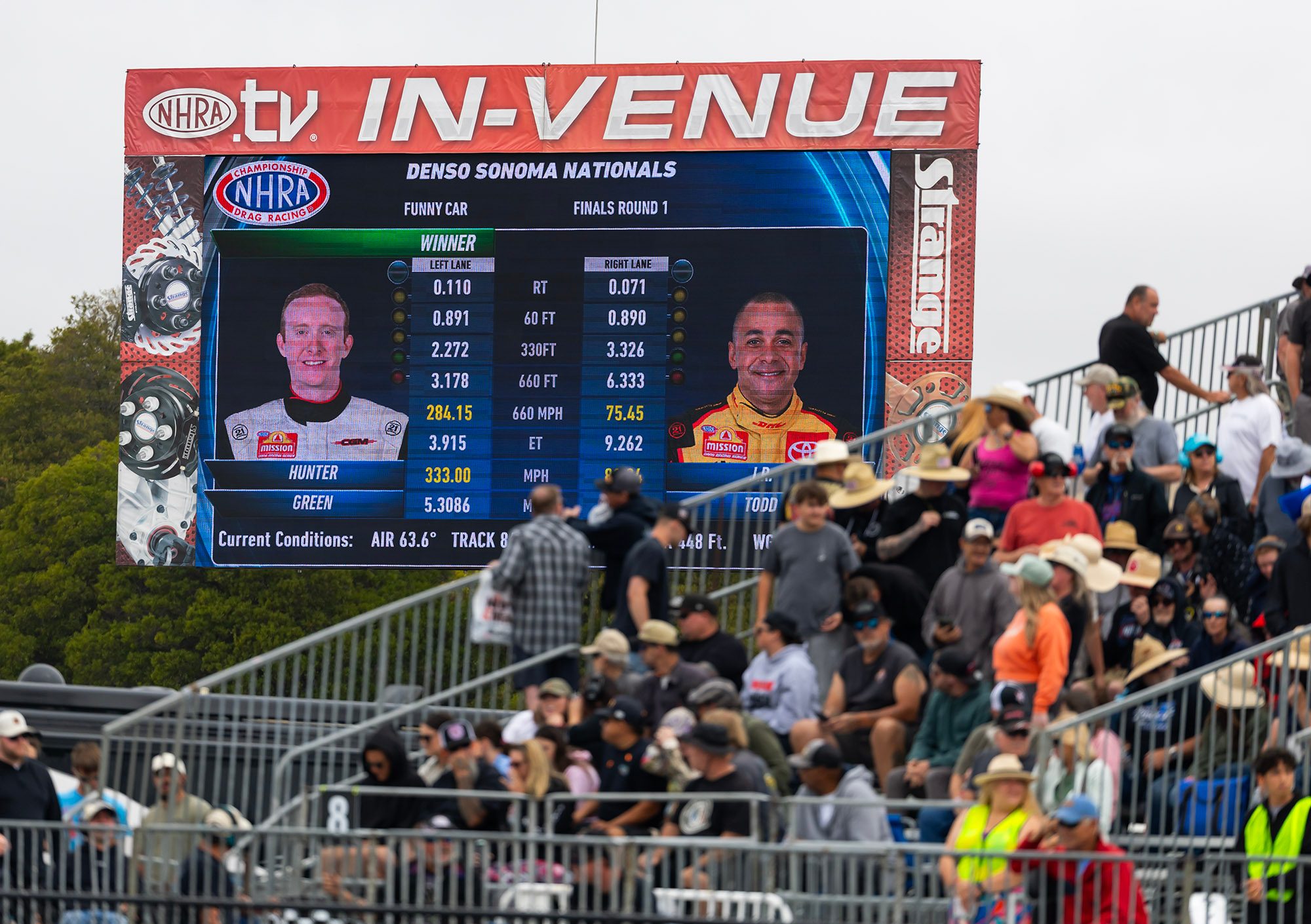 Fans watch the in-venue screen post the round-one pairing at the Sonoma Nationals