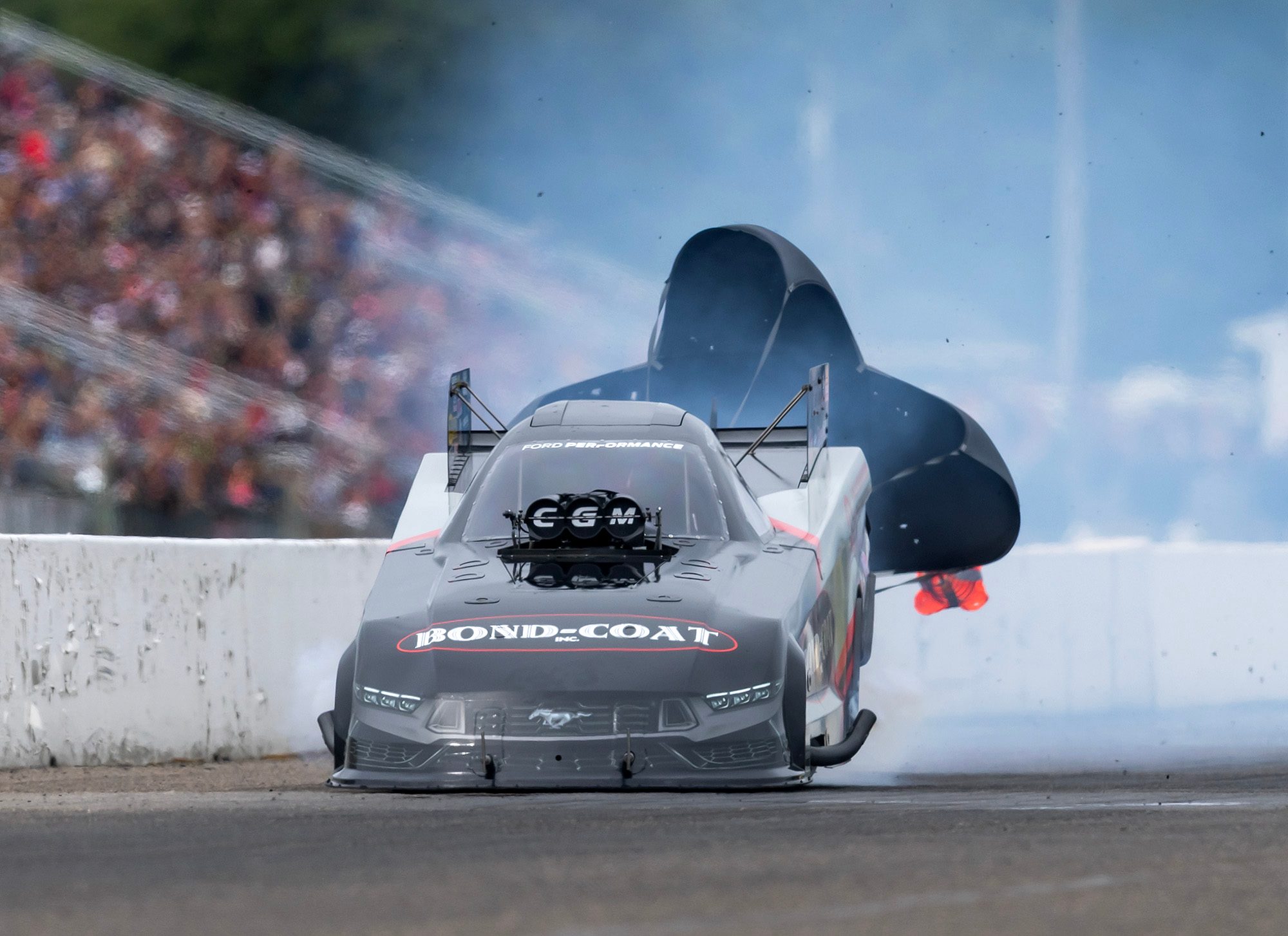 Launch: the Bond-Coat and BP CGM Funny Car in the first feet of the run