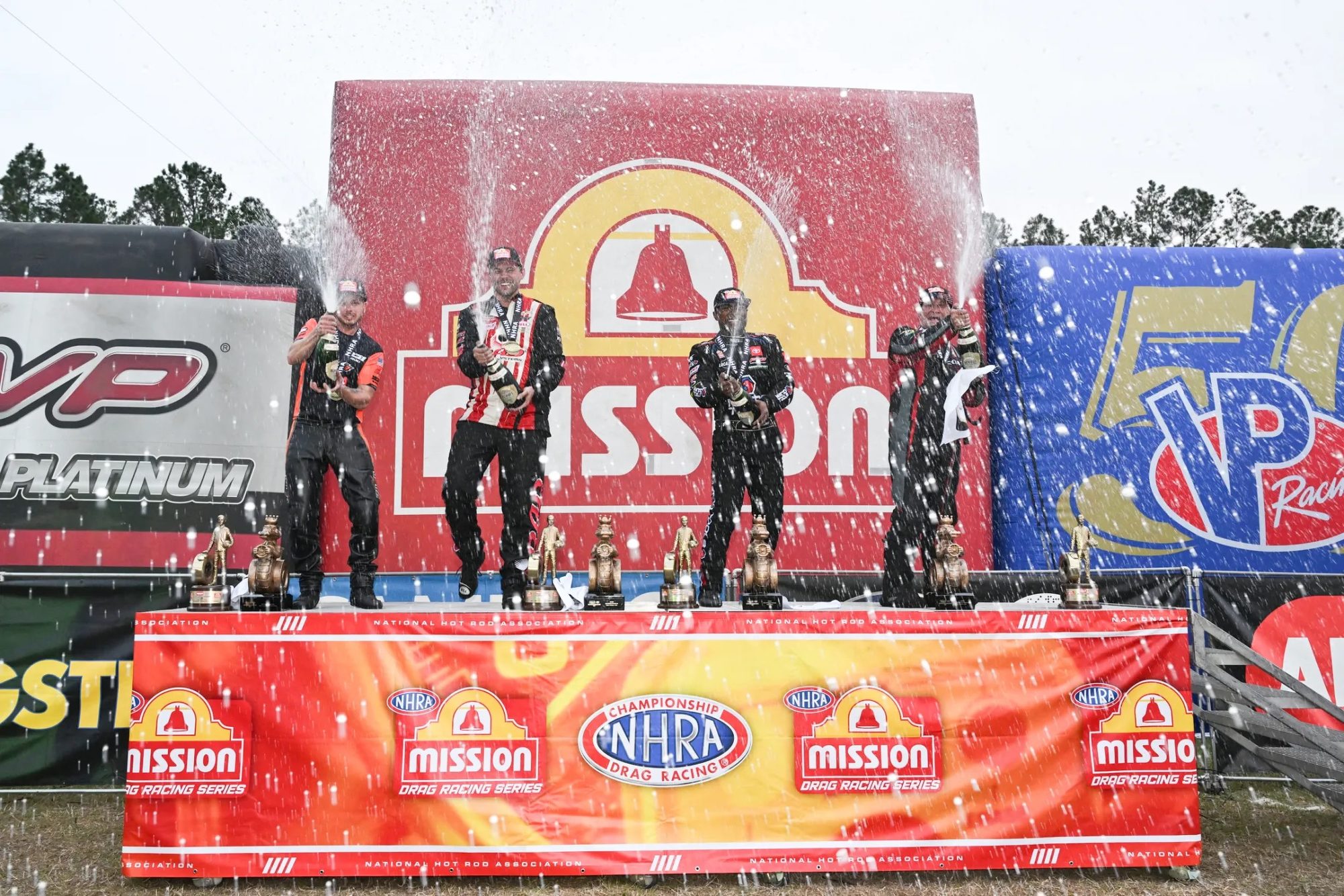 Champagne on the podium at a Mission Foods Drag Racing Series event
